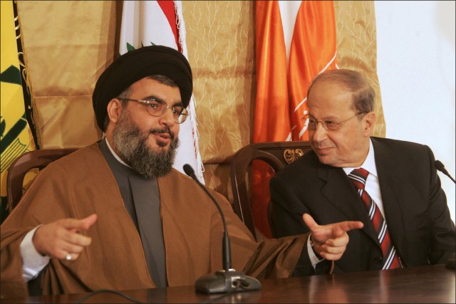 Hizbullah leader Hassan Nasrallah with Lebanese president Michel Aoun
