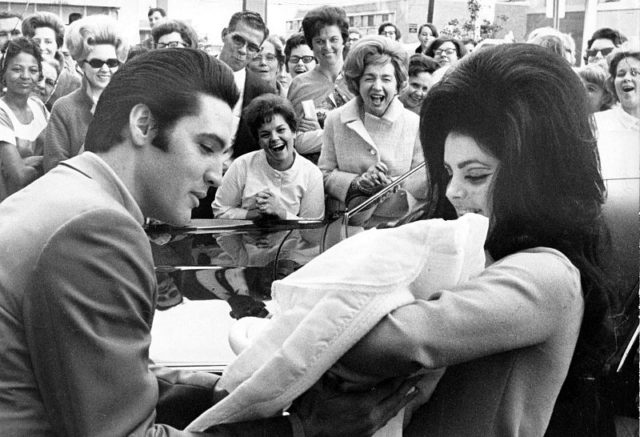 Elvis Presley and Priscilla with Lisa Marie, February 1968 wikipedia commons