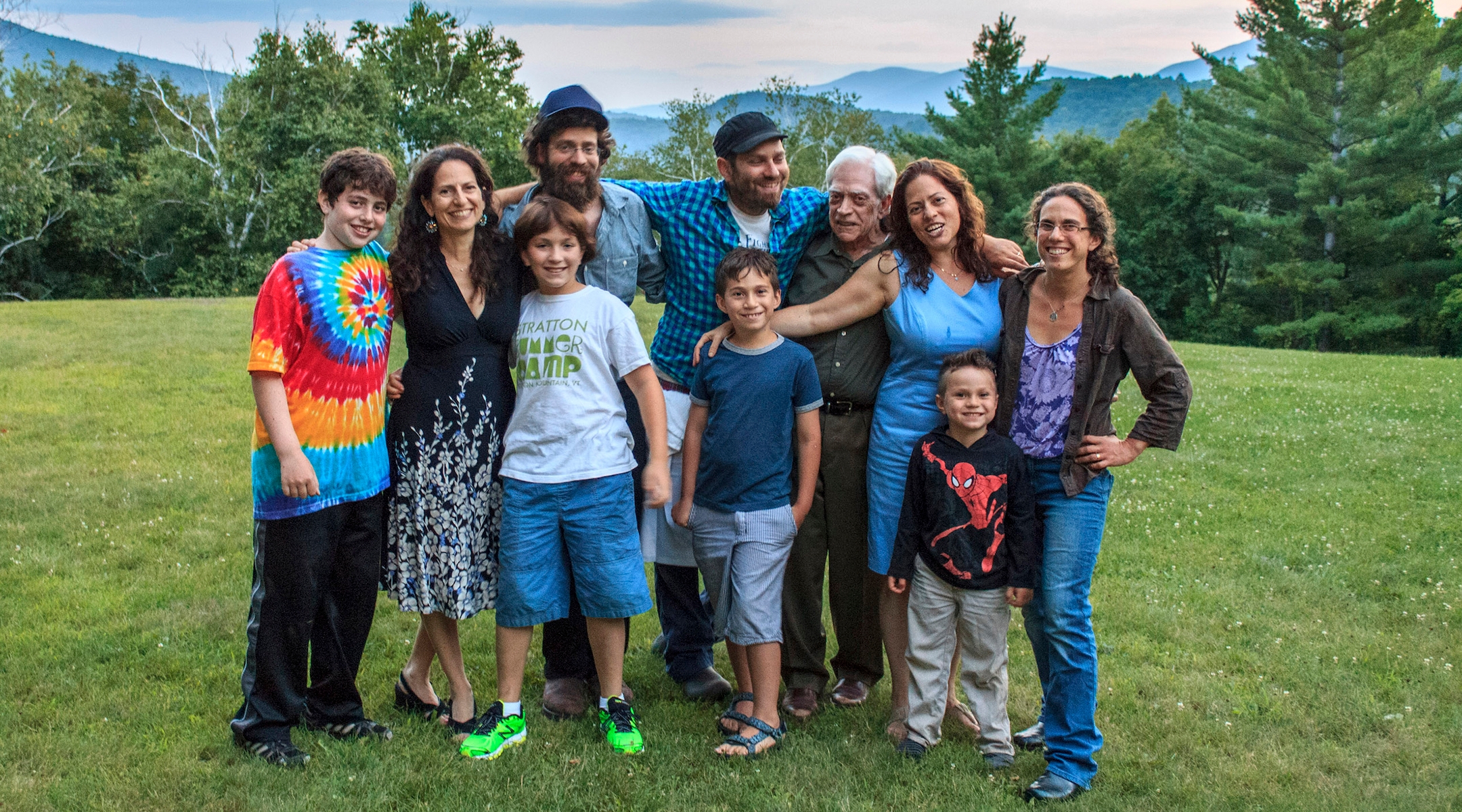 Three generations of a large extended family smile for the camera in rural Vermont