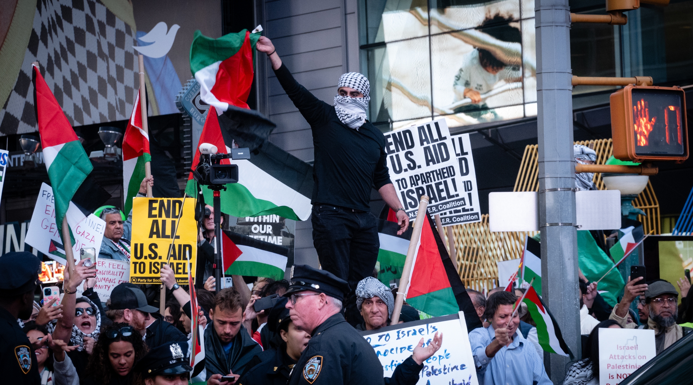 Pro-Palestinian rallies quickly gained steam, drawing hundreds of supporters to central locations in the city like Times Square, Oct. 13, 2023. (Luke Tress)