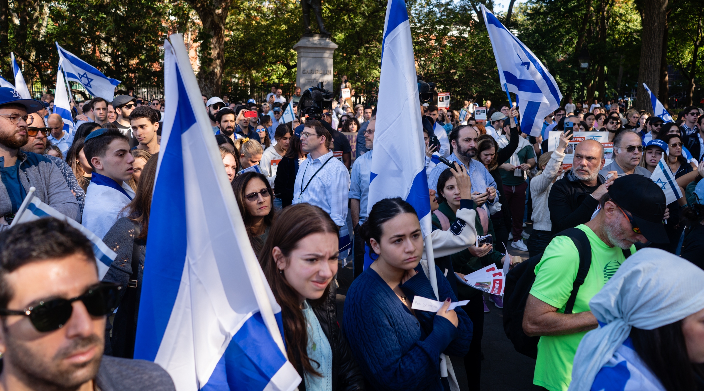 Jewish college students felt under siege in the weeks after the attack, as classmates and faculty expressed support for the Hamas invasion of Israel. Hundreds of Jewish NYU students and supporters gathered in solidarity in Washington Square Park, Oct. 26, 2024. (Luke Tress)