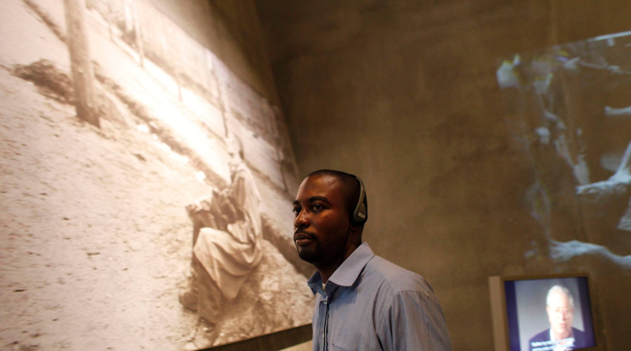 A Sudanese refugee tours a Holocaust museum
