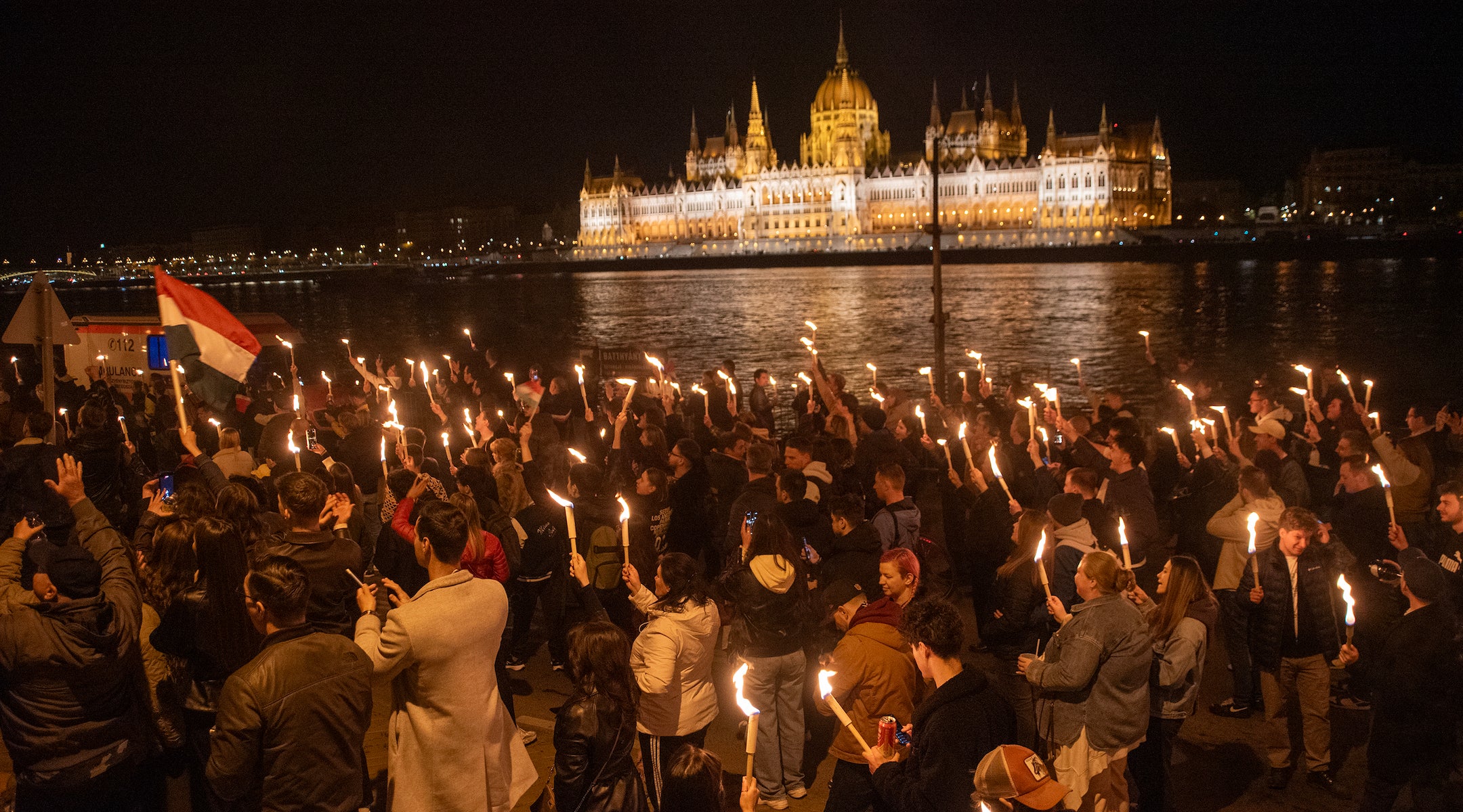A photo of people holding torches.